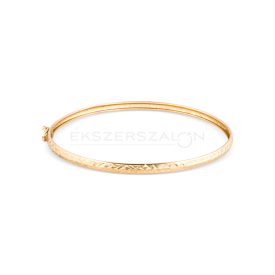 Sárga arany merev  karkötő metszett mintával